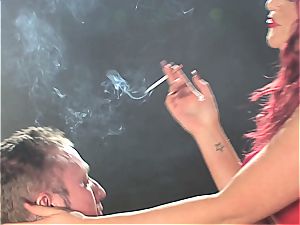 redhead biotch predominates a guy while smoking